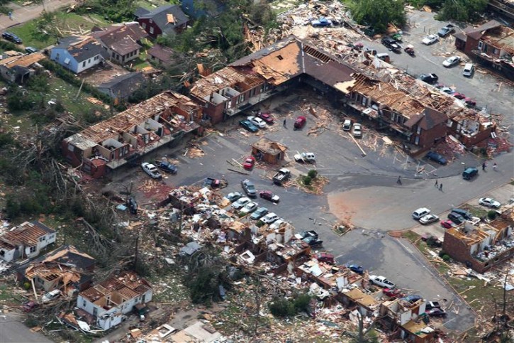 An aerial view shows extensive damage to homes and businesses in the path of tornadoes in Tuscaloosa, Alabama, April 28, 2011. Tornadoes and violent storms ripped through seven southern U.S. states, killing at least 259 people in the country's deadliest series of twisters in nearly four decades.  REUTERS/Marvin Gentry 